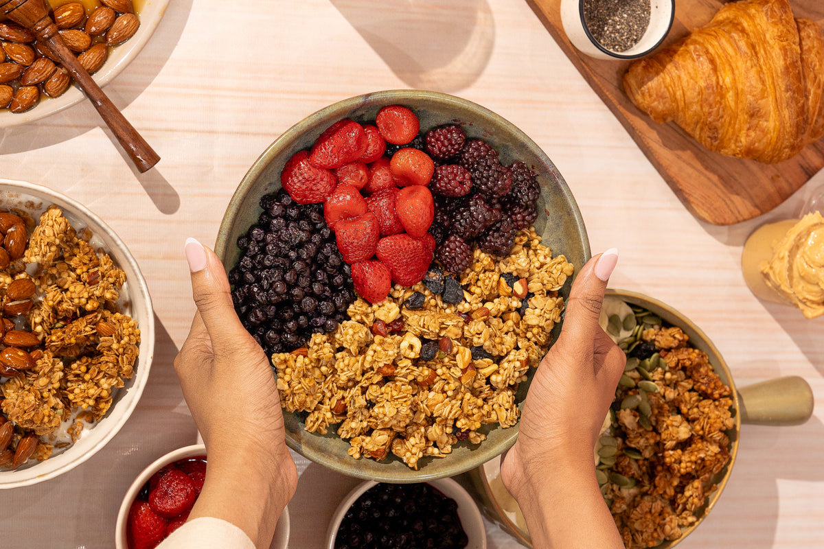 Granola bowl with oats, strawberries, blackberries, and crunchy clusters
